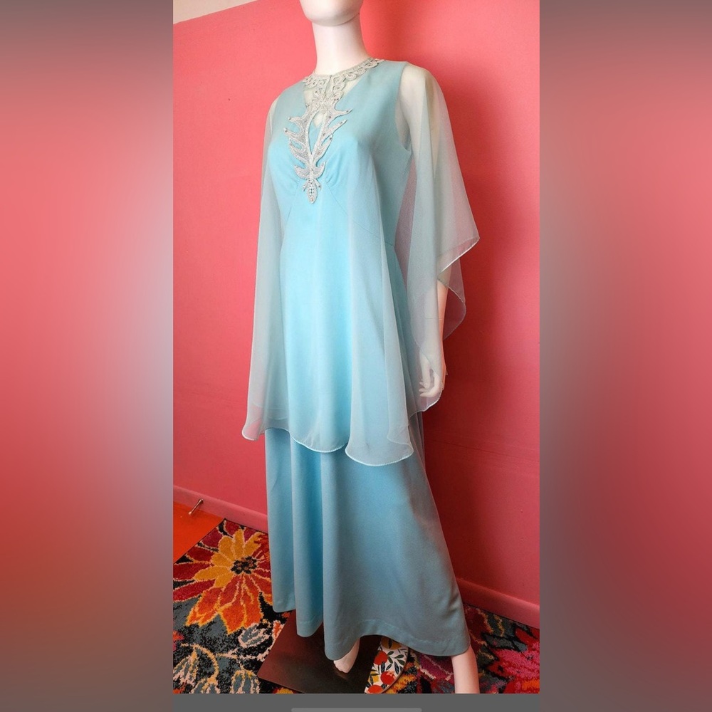 1960s American Vintage Blue Gold Gown with Dolman Sleeves
Betty Draper